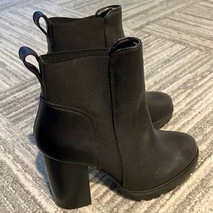 Brand new black leather boots by Steve Madden